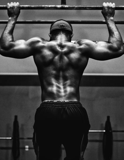 grayscale photo of man working out